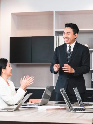 Group of coworkers in conference room during meeting, Business people in board room meeting at the office